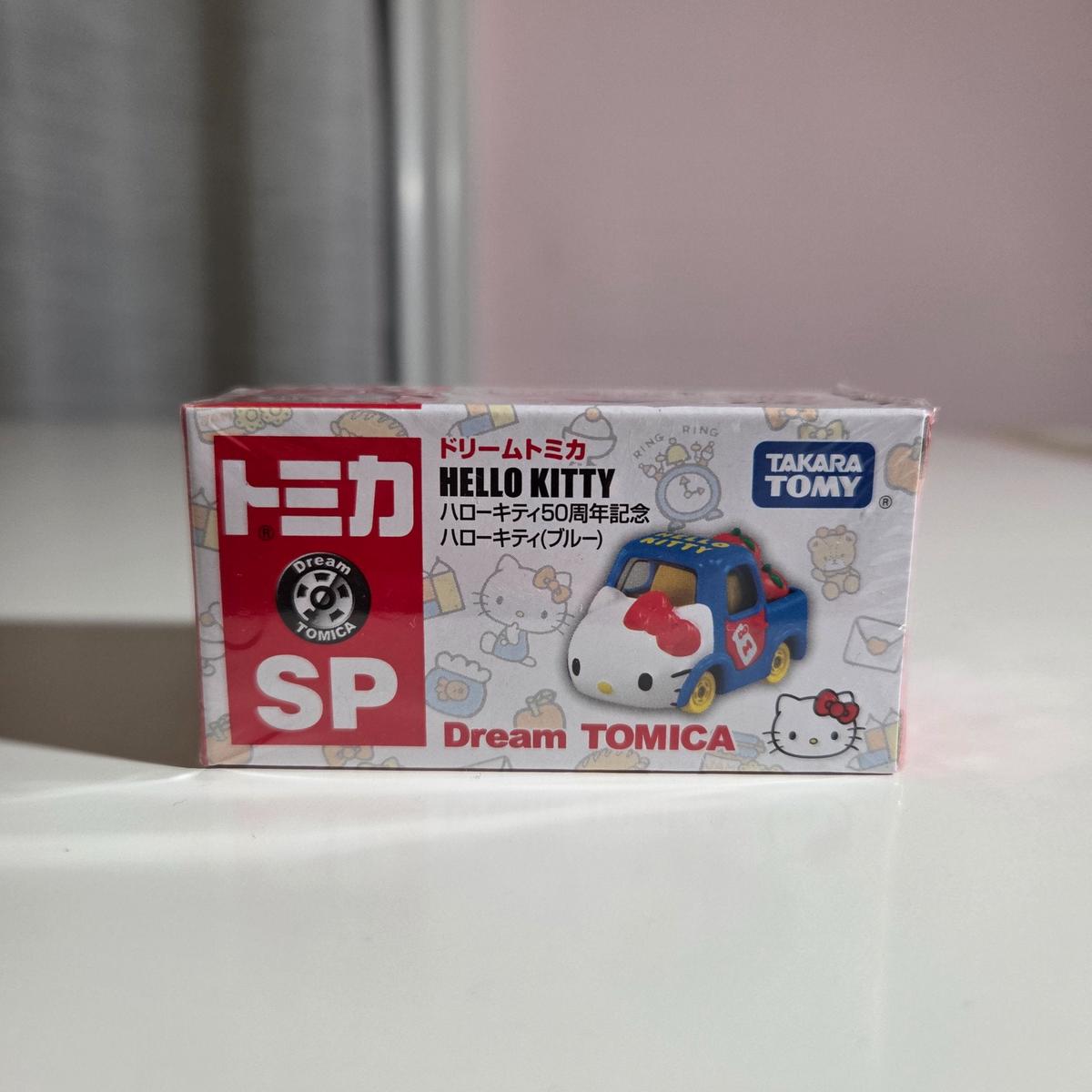 (Blue) SP Hello Kitty Apple Carry - Hello Kitty 50th Anniversary Apple Carry Car Diecast Model Dream Tomica by Takara Tomy