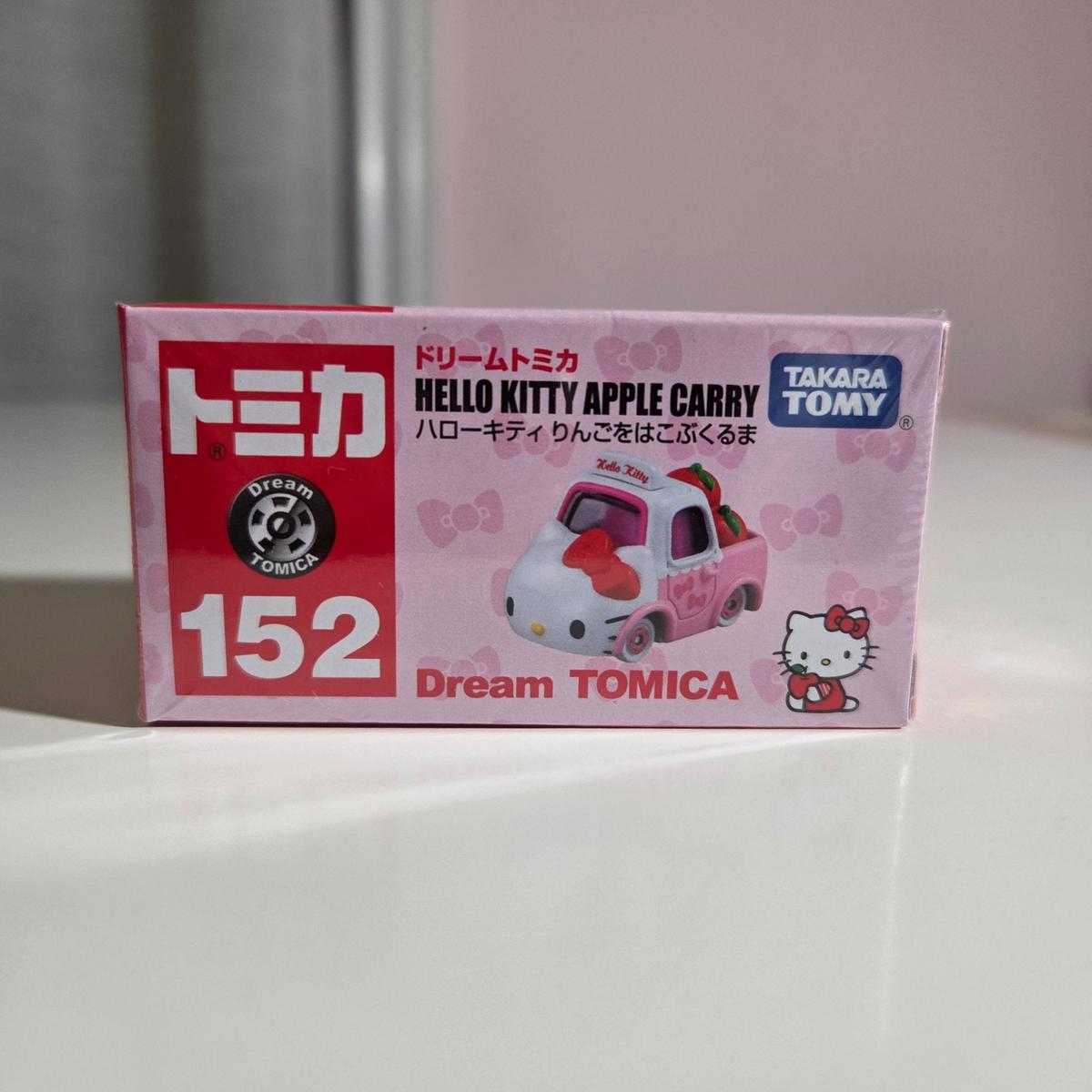  152 Hello Kitty Apple Carry - Hello Kitty 50th Anniversary Apple Carry Car Diecast Model Dream Tomica by Takara Tomy